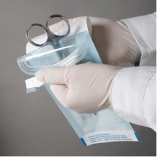 Self sealing sterilization pouch
